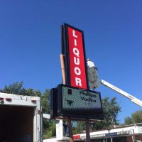 custom pylon sign liquor installation